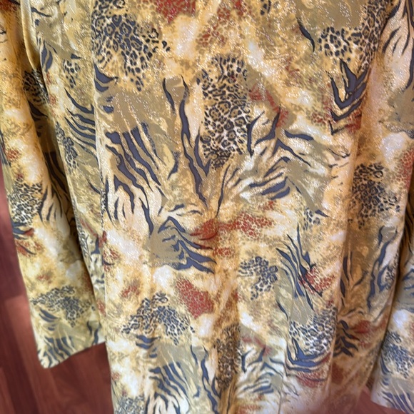 Size 1XL animal print sheer top with tassels along bottom - Picture 2 of 4